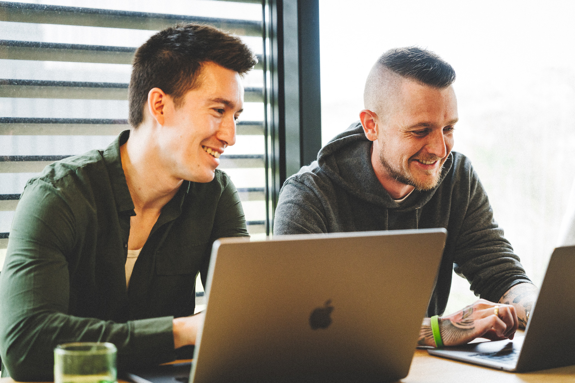 Two Octily developers pairing on code