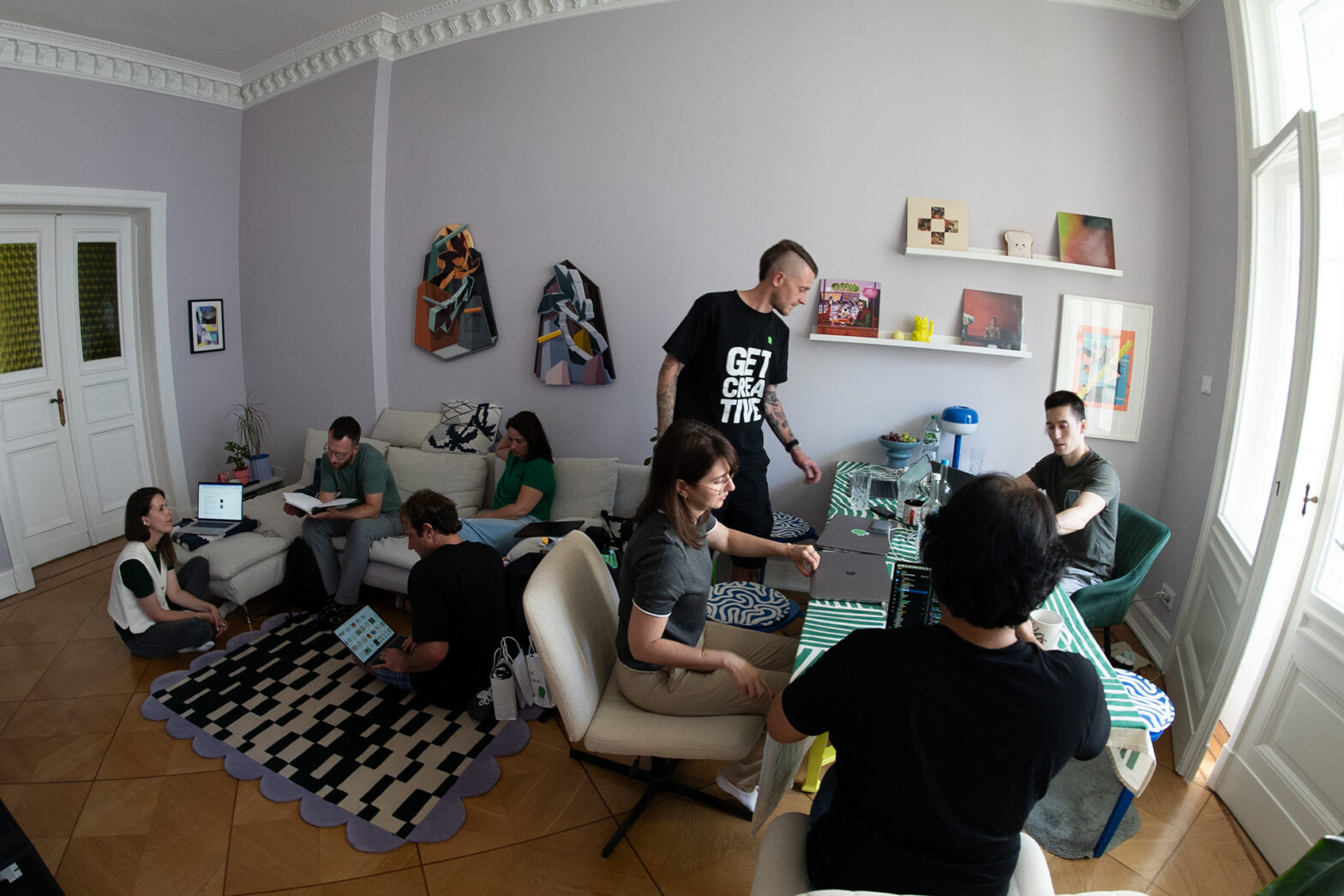 Octily team brainstorming together in a creative living room